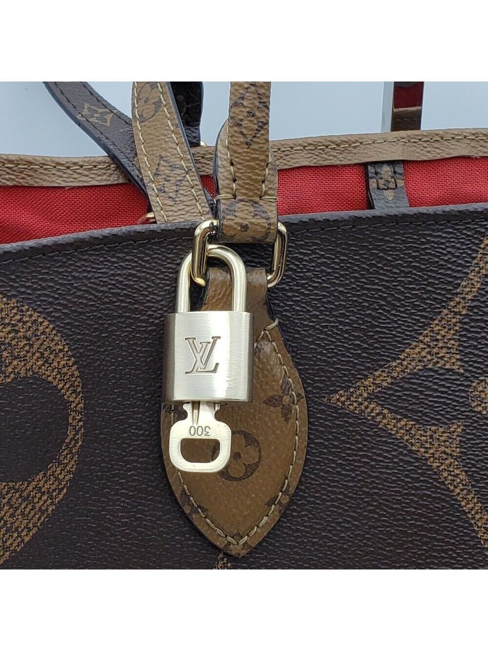 Authentic Louis Vuitton Gold Padlock In Excellent Shiny Brass 011526